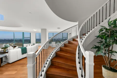 a bedroom with a bed and a couch