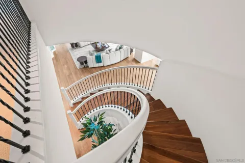 a view of a balcony with furniture