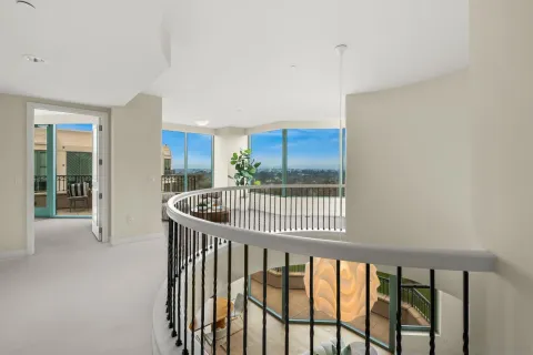 a living room with furniture and a lamp