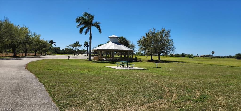 22728 Yellow Button Lane Alva, FL 33920 - Photo 8 of 12 View of property's community featuring a gazebo and a yard