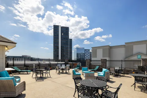 a view of a terrace with chairs