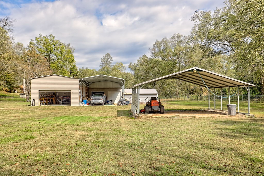 1483 Hilltop Road Murphy, NC 28906 - Photo 3 of 74 a view of house with outdoor space and swimming pool