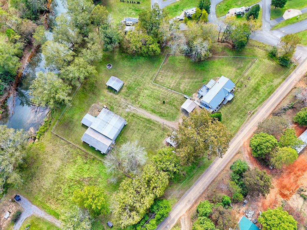 1483 Hilltop Road Murphy, NC 28906 - Photo 5 of 74 an aerial view of a house with a yard basket ball court and outdoor seating