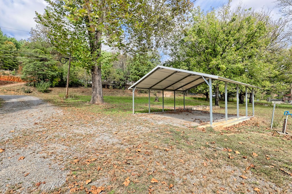 1483 Hilltop Road Murphy, NC 28906 - Photo 53 of 74 a view of a house with backyard and sitting area