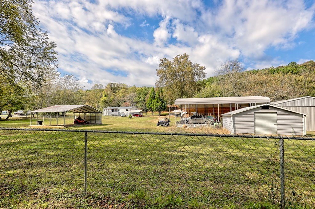 1483 Hilltop Road Murphy, NC 28906 - Photo 57 of 74 a front view of a house with a yard