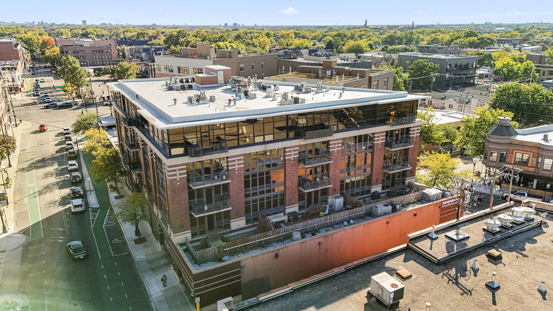 4020 North Damen Avenue, Unit 404 Chicago, IL 60618 - Photo 1 of 17 a view of a balcony with a table and chairs