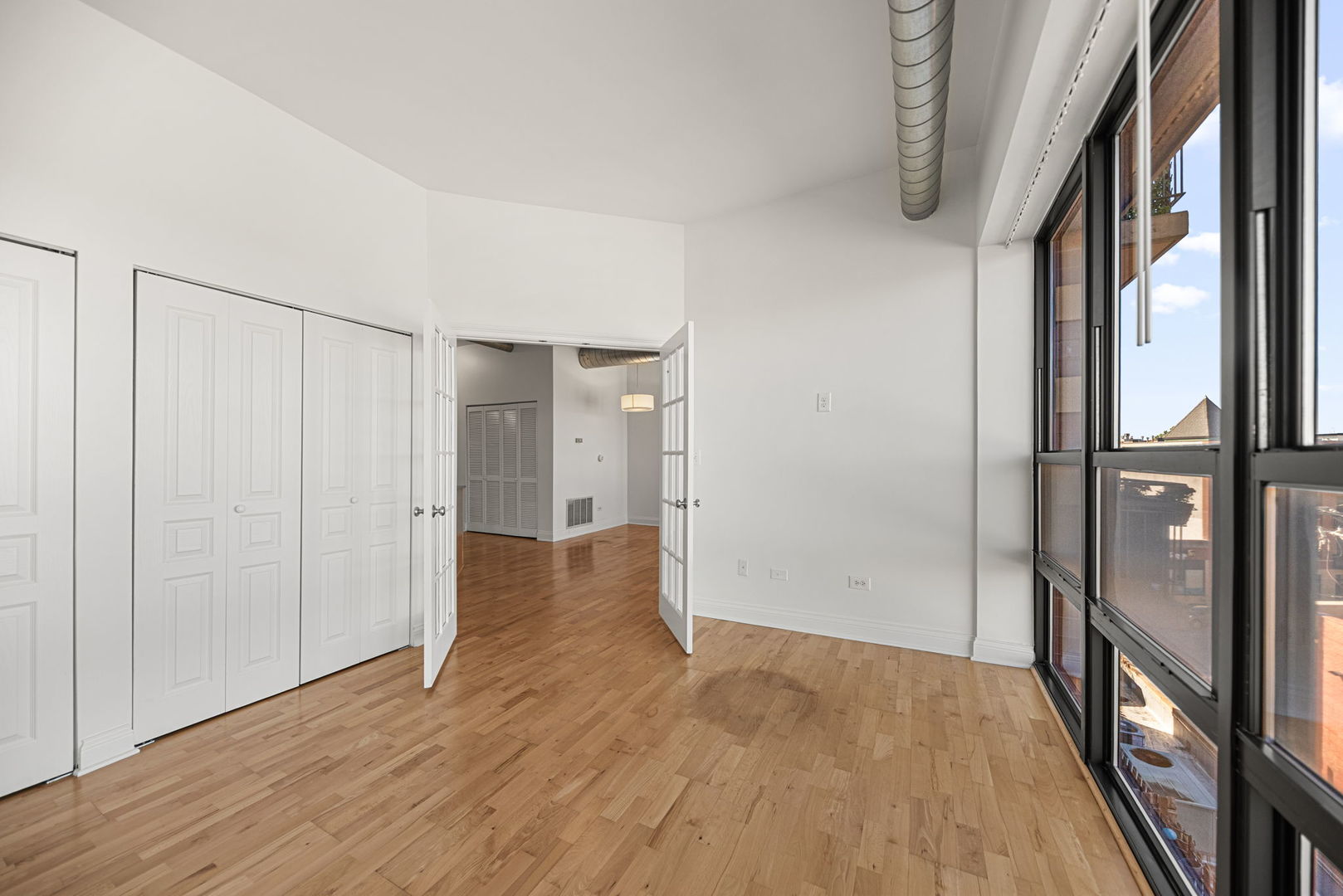 4020 North Damen Avenue, Unit 404 Chicago, IL 60618 - Photo 12 of 17 a view of hallway with wooden floor