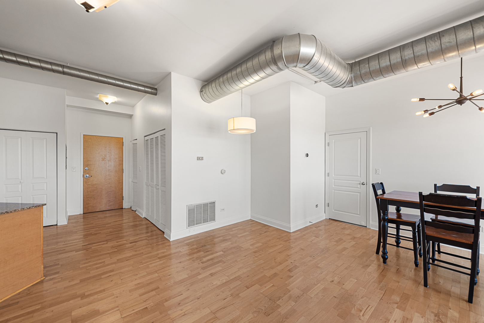 4020 North Damen Avenue, Unit 404 Chicago, IL 60618 - Photo 16 of 17 a view of a dining room with furniture