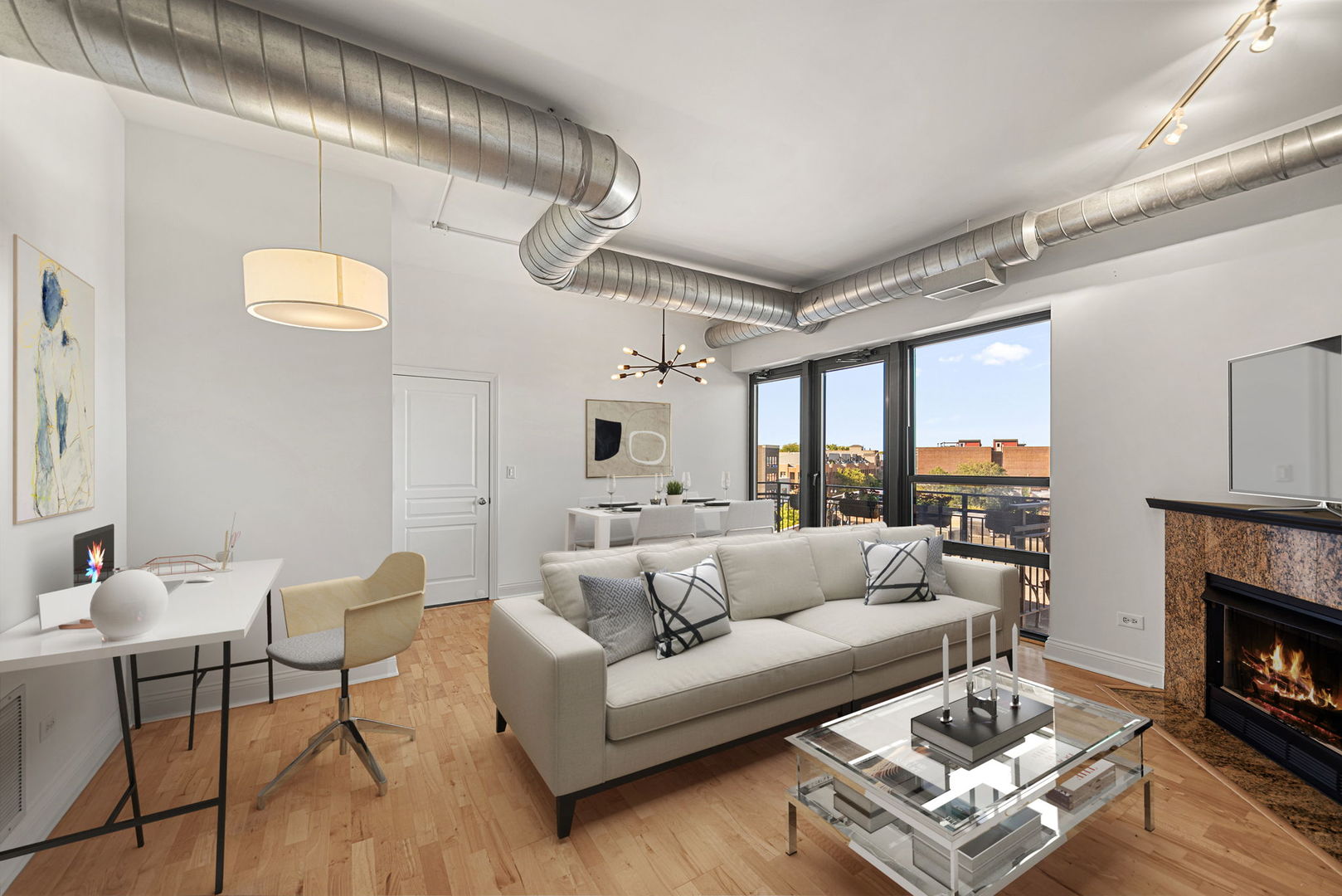 4020 North Damen Avenue, Unit 404 Chicago, IL 60618 - Photo 2 of 17 a living room with furniture a fireplace and a window