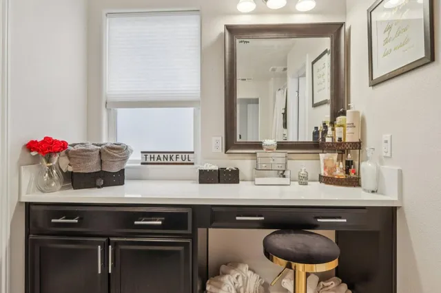 a kitchen with a sink and a stove