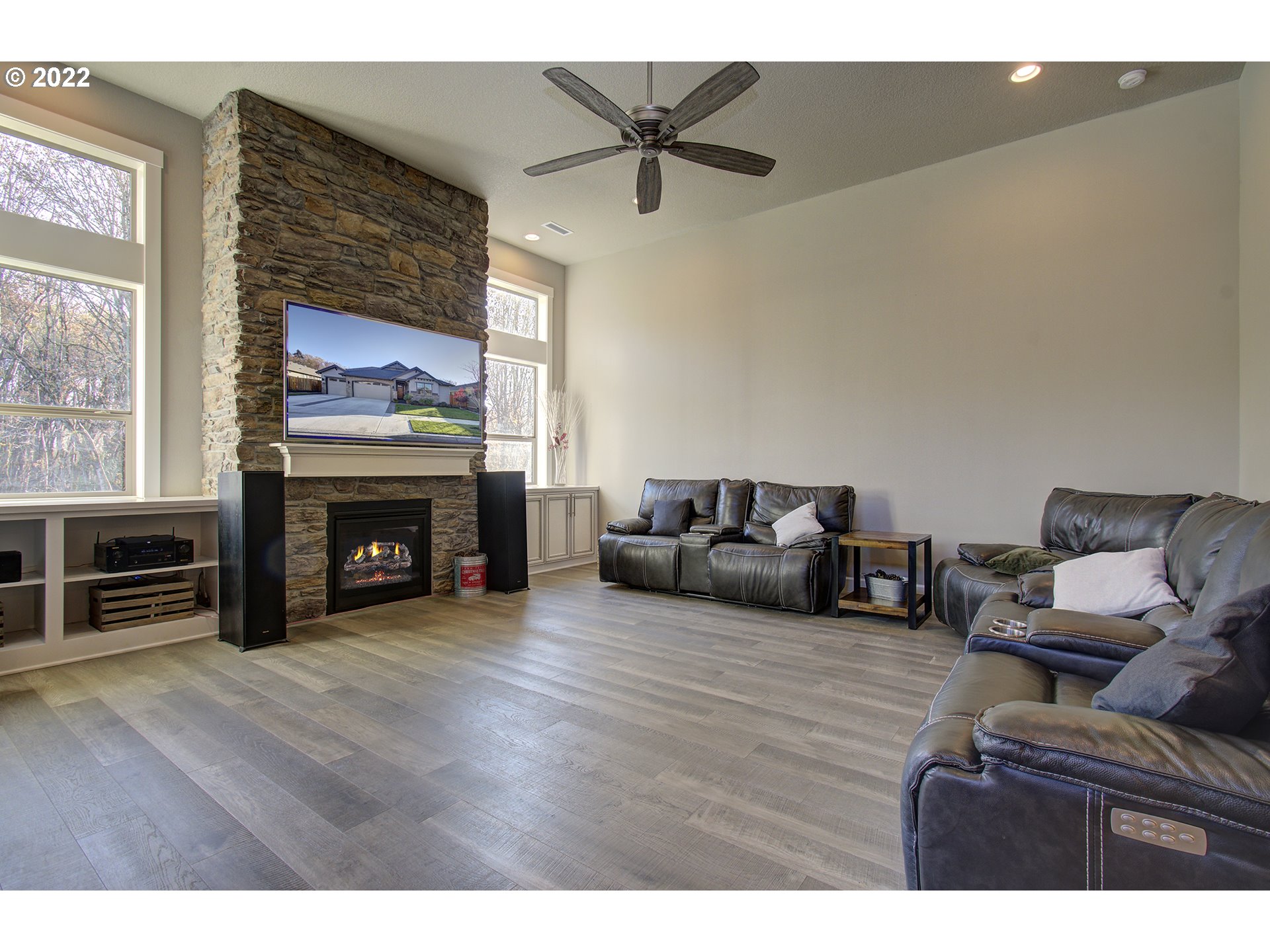 1695 South Harrier Road Ridgefield, WA 98642 - Photo 4 of 32 a living room with furniture and a fireplace