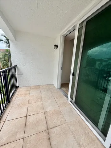 a view of house with a yard and slide