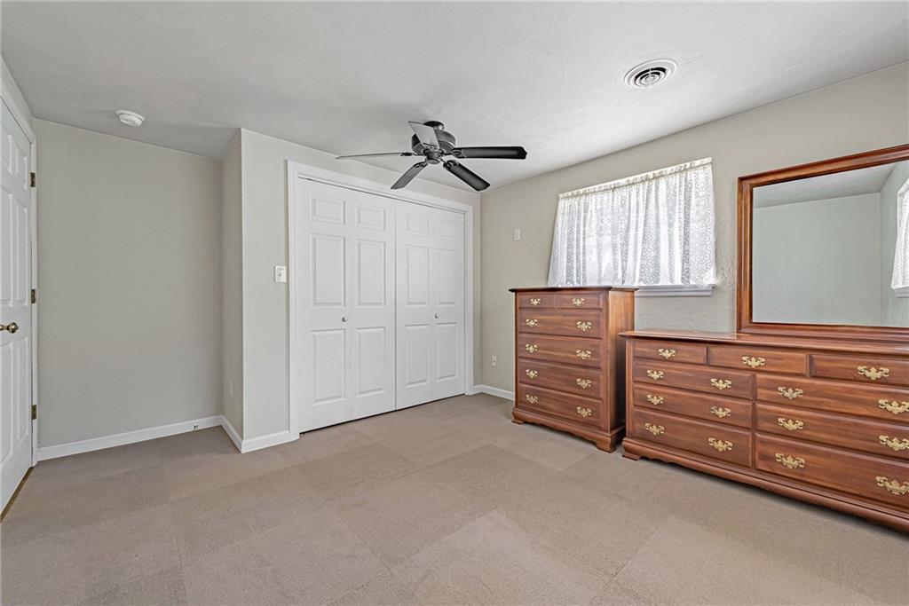 1431 New Stanton Ruffsdale Road Ruffs Dale, PA 15679 - Photo 11 of 25 a view of a livingroom with furniture and window