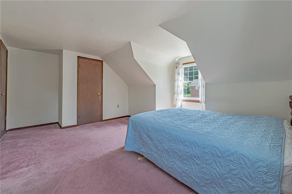 1431 New Stanton Ruffsdale Road Ruffs Dale, PA 15679 - Photo 15 of 25 an empty room with windows