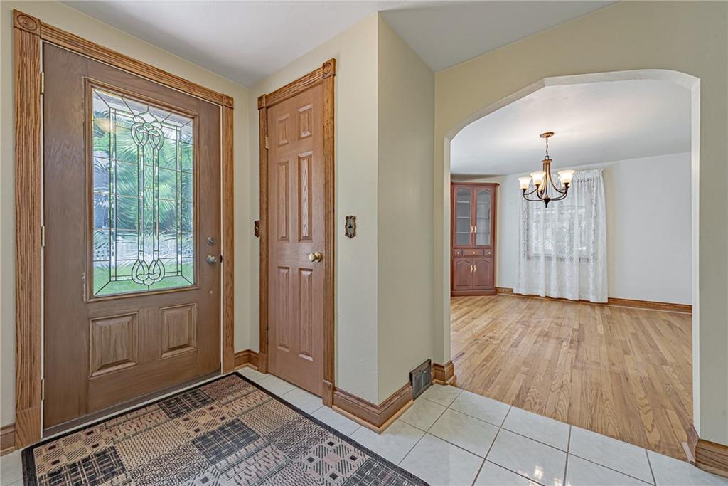1431 New Stanton Ruffsdale Road Ruffs Dale, PA 15679 - Photo 2 of 25 a view of an empty room with window and a livingroom