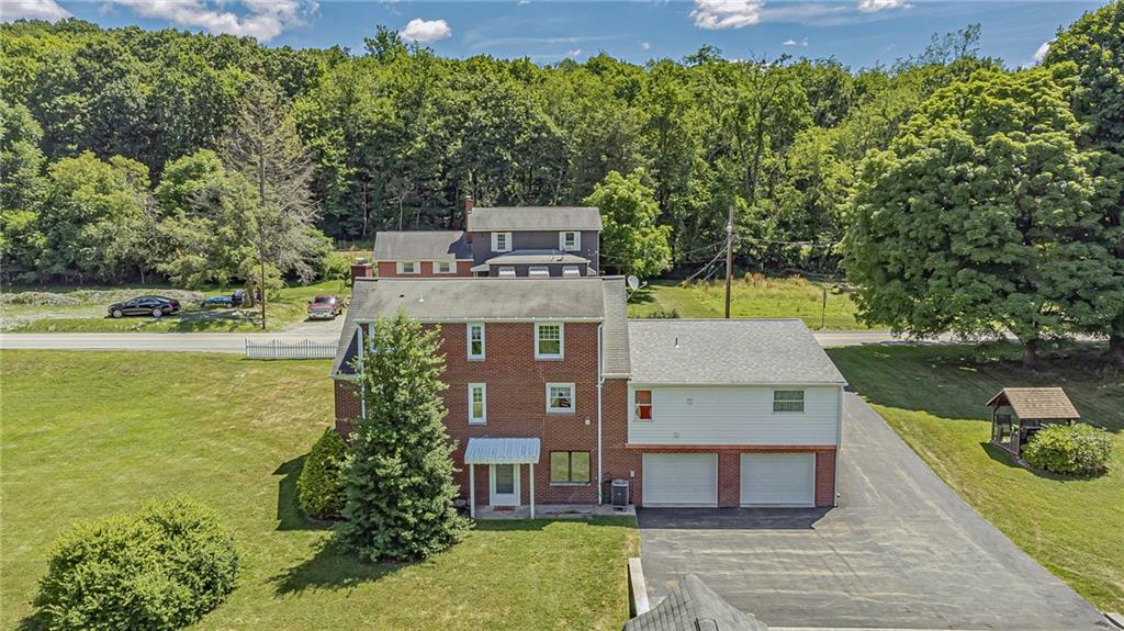 1431 New Stanton Ruffsdale Road Ruffs Dale, PA 15679 - Photo 23 of 25 an aerial view of a house with a garden view