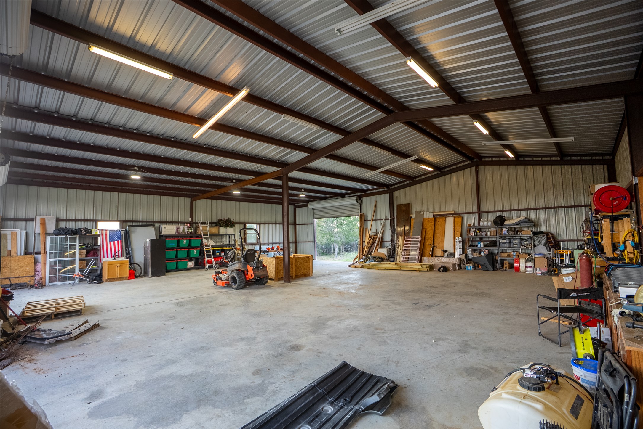 0 Oil Field Road Lockhart, TX 78644 - Photo 12 of 36 a view of a garage with a bike and car
