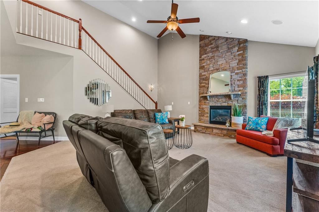 211 Taylor Ridge Lane Mars, PA 16046 - Photo 24 of 50 a living room with furniture fireplace and a flat screen tv