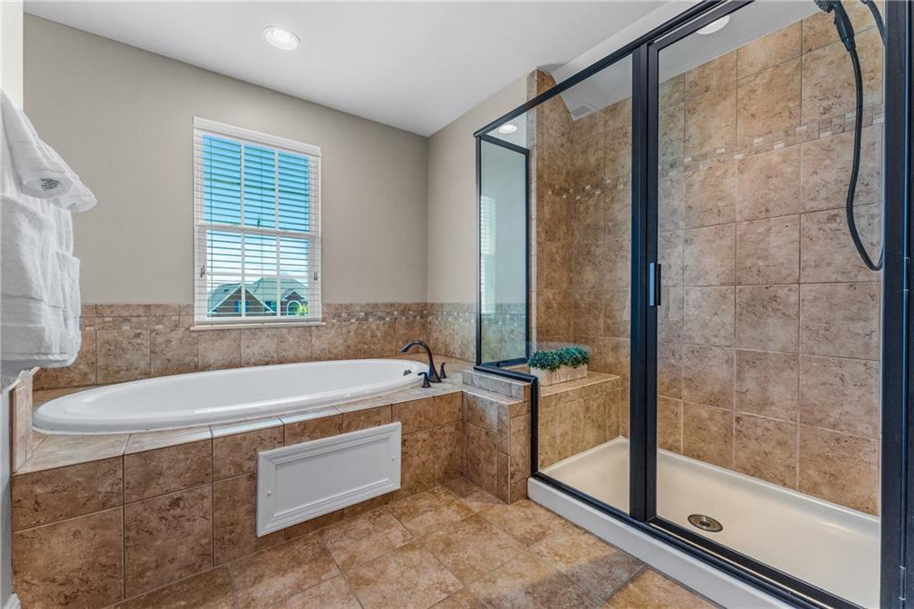 211 Taylor Ridge Lane Mars, PA 16046 - Photo 35 of 50 a bathroom with a bathtub and a shower