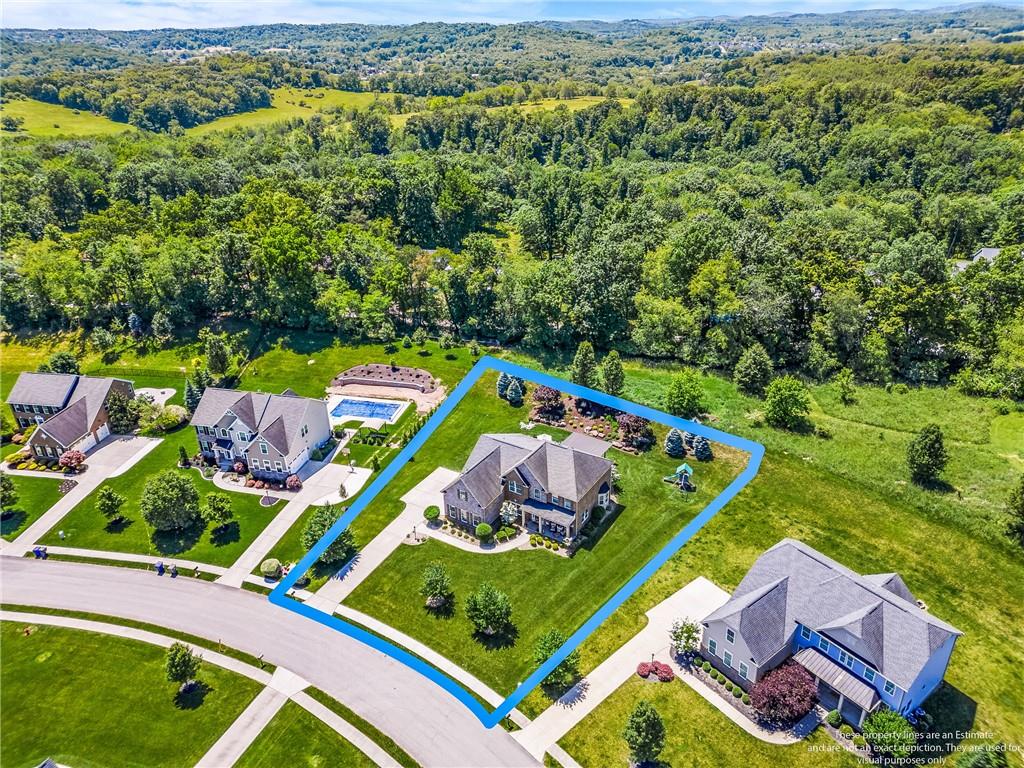 211 Taylor Ridge Lane Mars, PA 16046 - Photo 4 of 50 an aerial view of a tennis ground and a houses