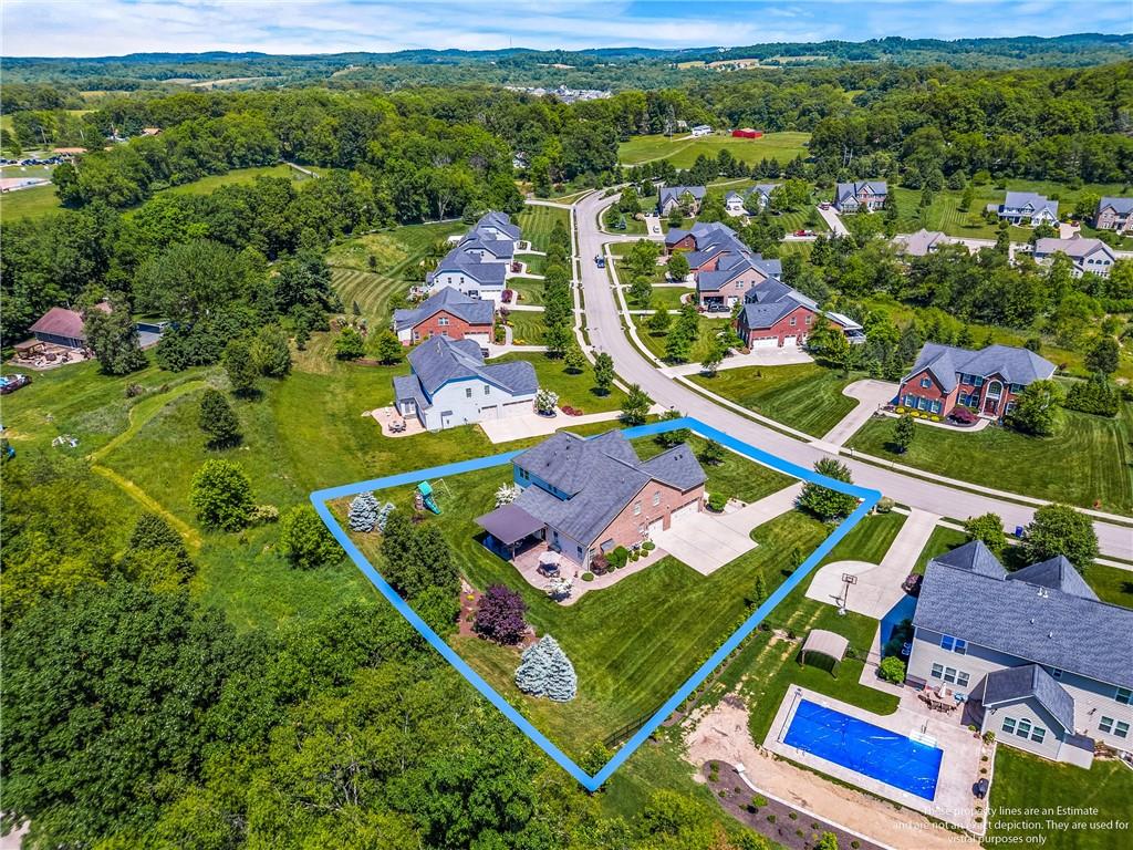 211 Taylor Ridge Lane Mars, PA 16046 - Photo 49 of 50 an aerial view of a tennis ground and a houses