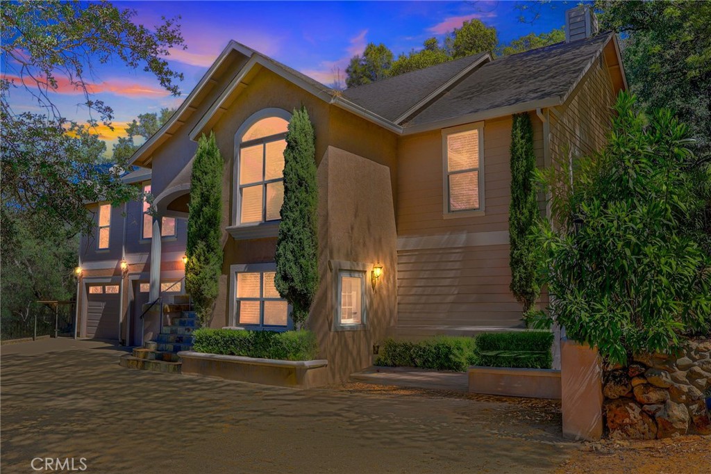 19370 Park Ridge Drive Hidden Valley Lake, CA 95467 - Photo 3 of 61 a front view of a house with a yard