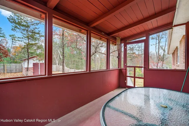 a view of a room with a large window