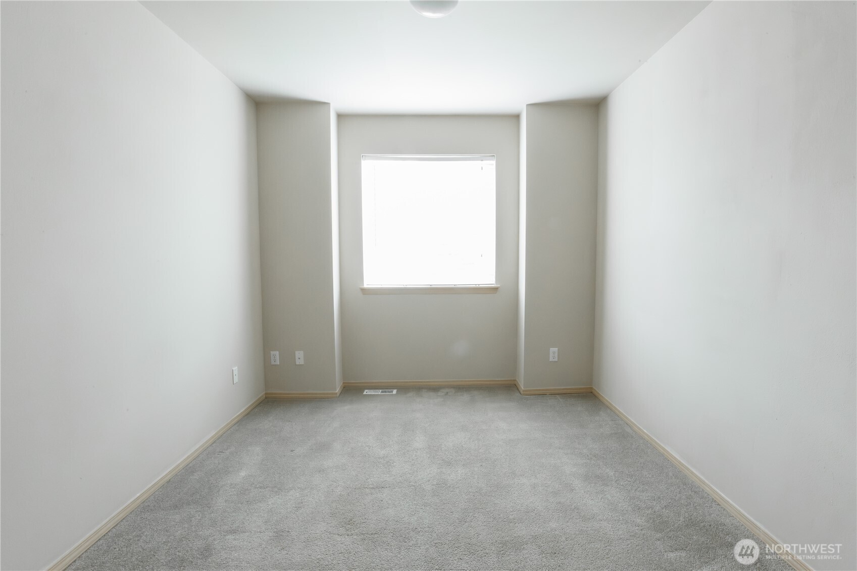 22463 Southeast 244th Street Maple Valley, WA 98038 - Photo 15 of 26 an empty room with a window