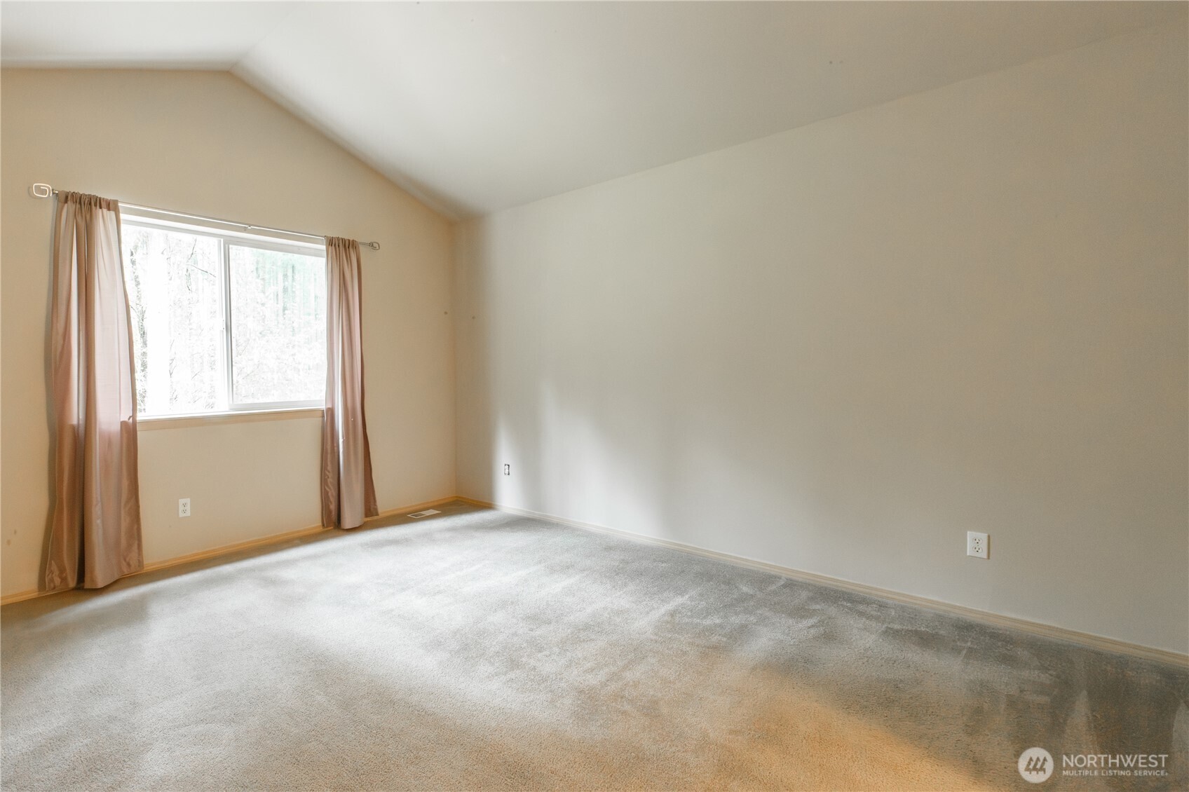 22463 Southeast 244th Street Maple Valley, WA 98038 - Photo 16 of 26 a view of an empty room with a window