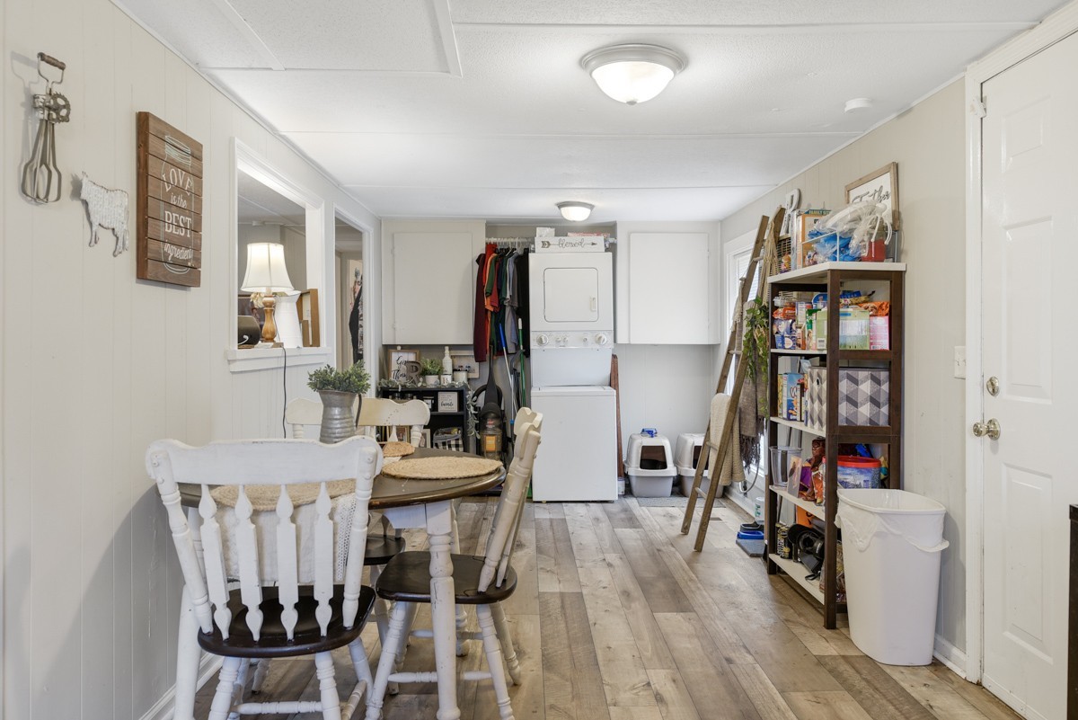 6016 Highland Road Orlinda, TN 37141 - Photo 20 of 34 a view of a dining room with furniture and wooden floor