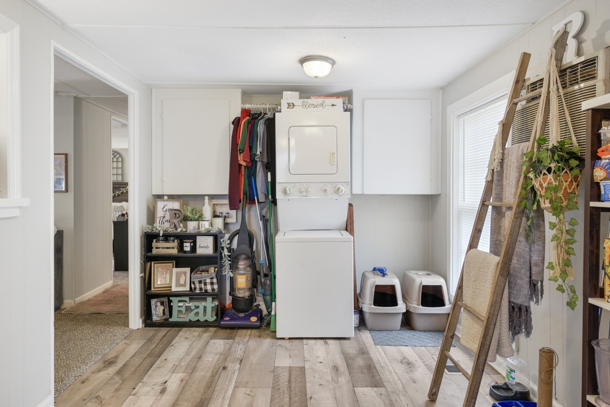 6016 Highland Road Orlinda, TN 37141 - Photo 21 of 34 a view of walk in closet with clothes and shoes