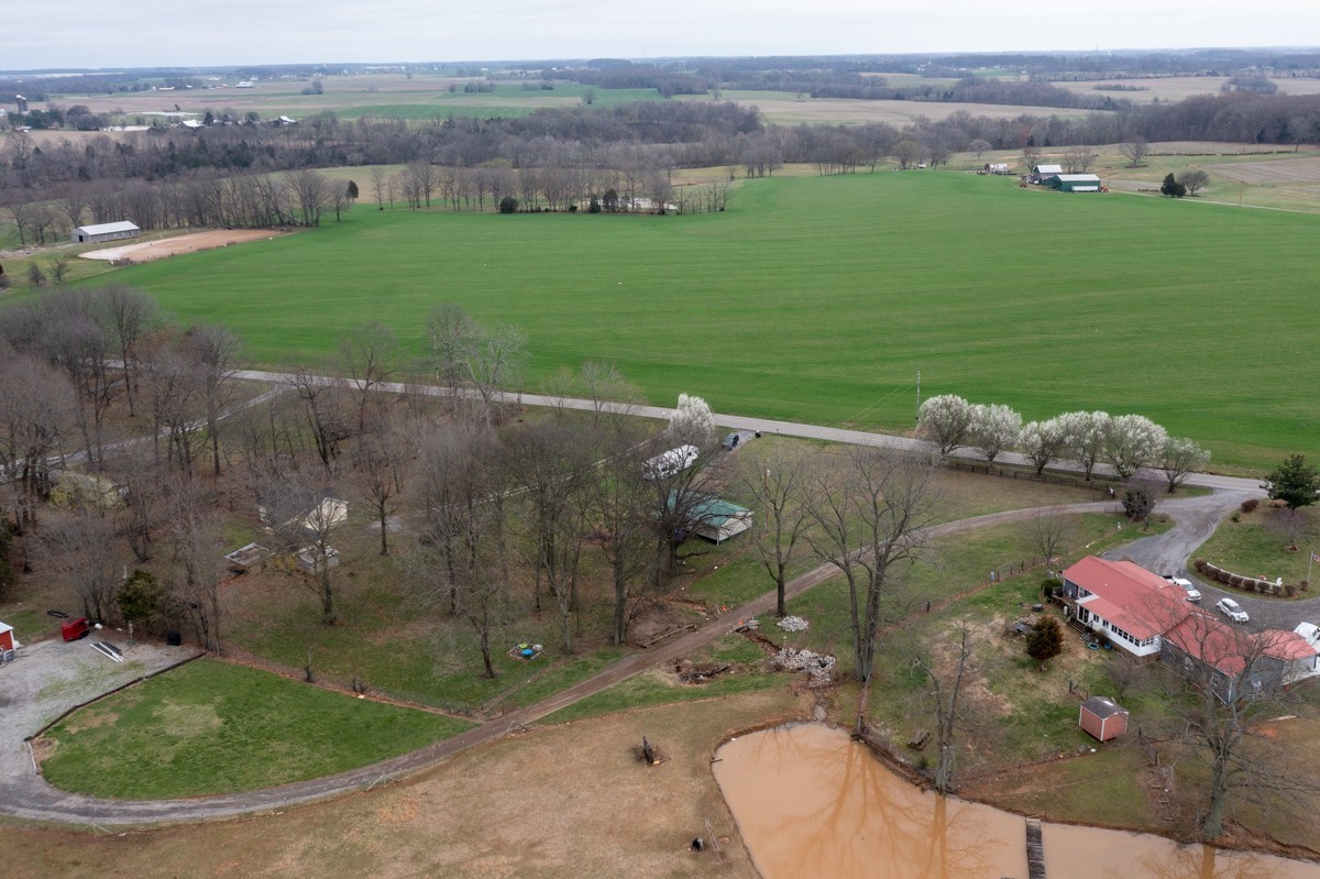 6016 Highland Road Orlinda, TN 37141 - Photo 31 of 34 an aerial view of a house with a yard