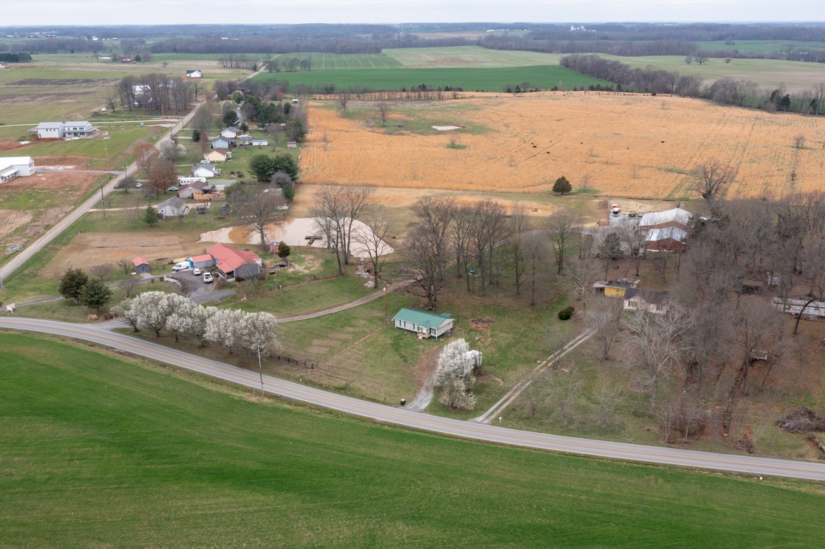 6016 Highland Road Orlinda, TN 37141 - Photo 4 of 34 an aerial view of a house with a yard