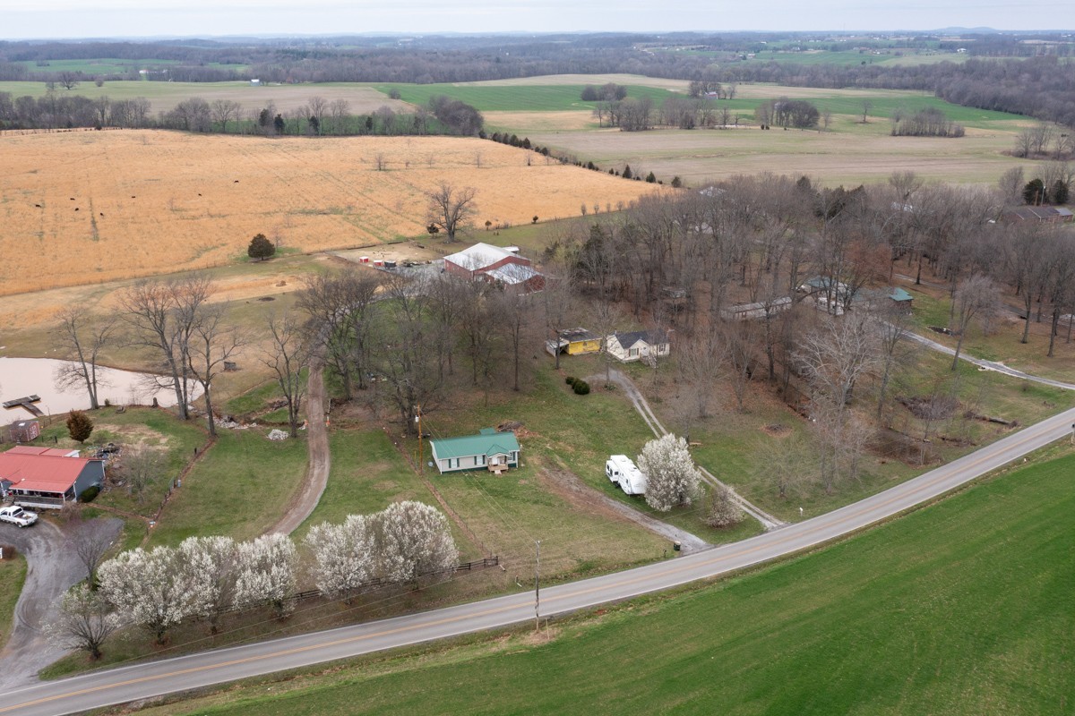 6016 Highland Road Orlinda, TN 37141 - Photo 5 of 34 an aerial view of a house with a yard