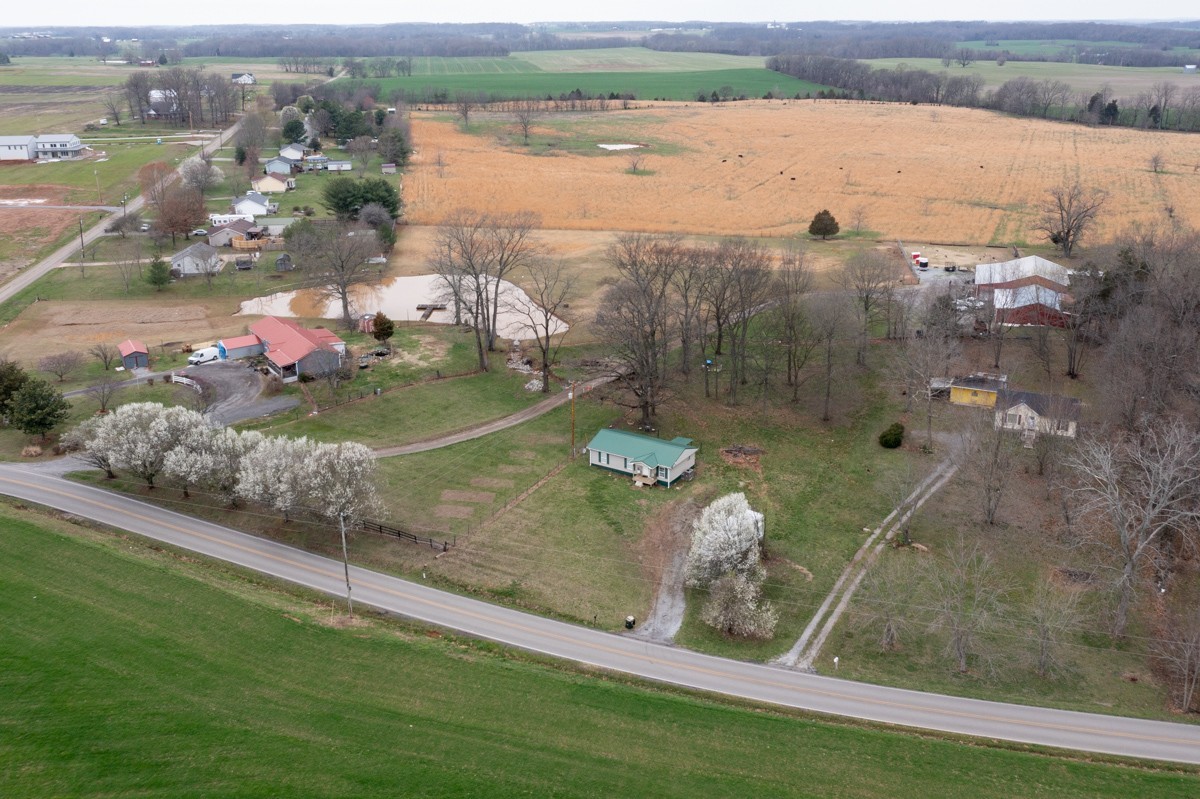 6016 Highland Road Orlinda, TN 37141 - Photo 7 of 34 an aerial view of a houses with outdoor space