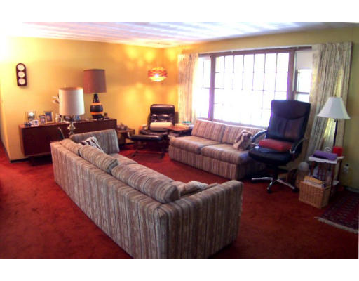 32 Ansie Road Chelmsford, MA 01824 - Photo 5 of 5 a living room with furniture and a large window