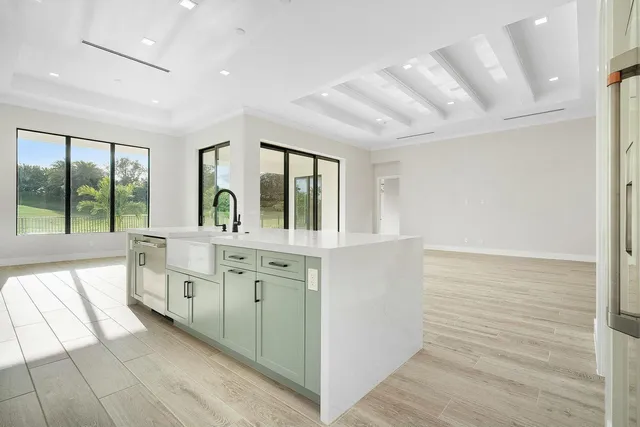 a view of a room with large windows