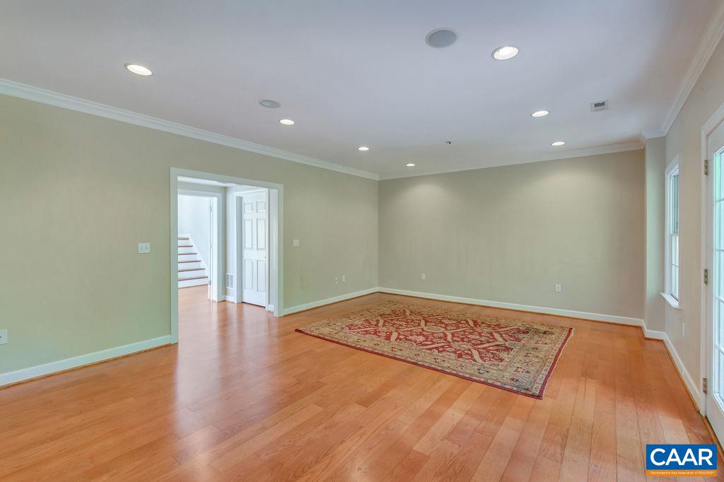 1970 Stillhouse Road Charlottesville, VA 22901 - Photo 31 of 51 a view of an empty room with wooden floor and closet