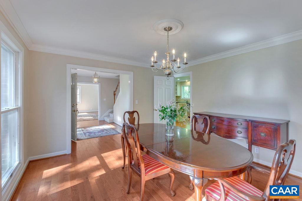 1970 Stillhouse Road Charlottesville, VA 22901 - Photo 8 of 51 a dining room with furniture and a chandelier