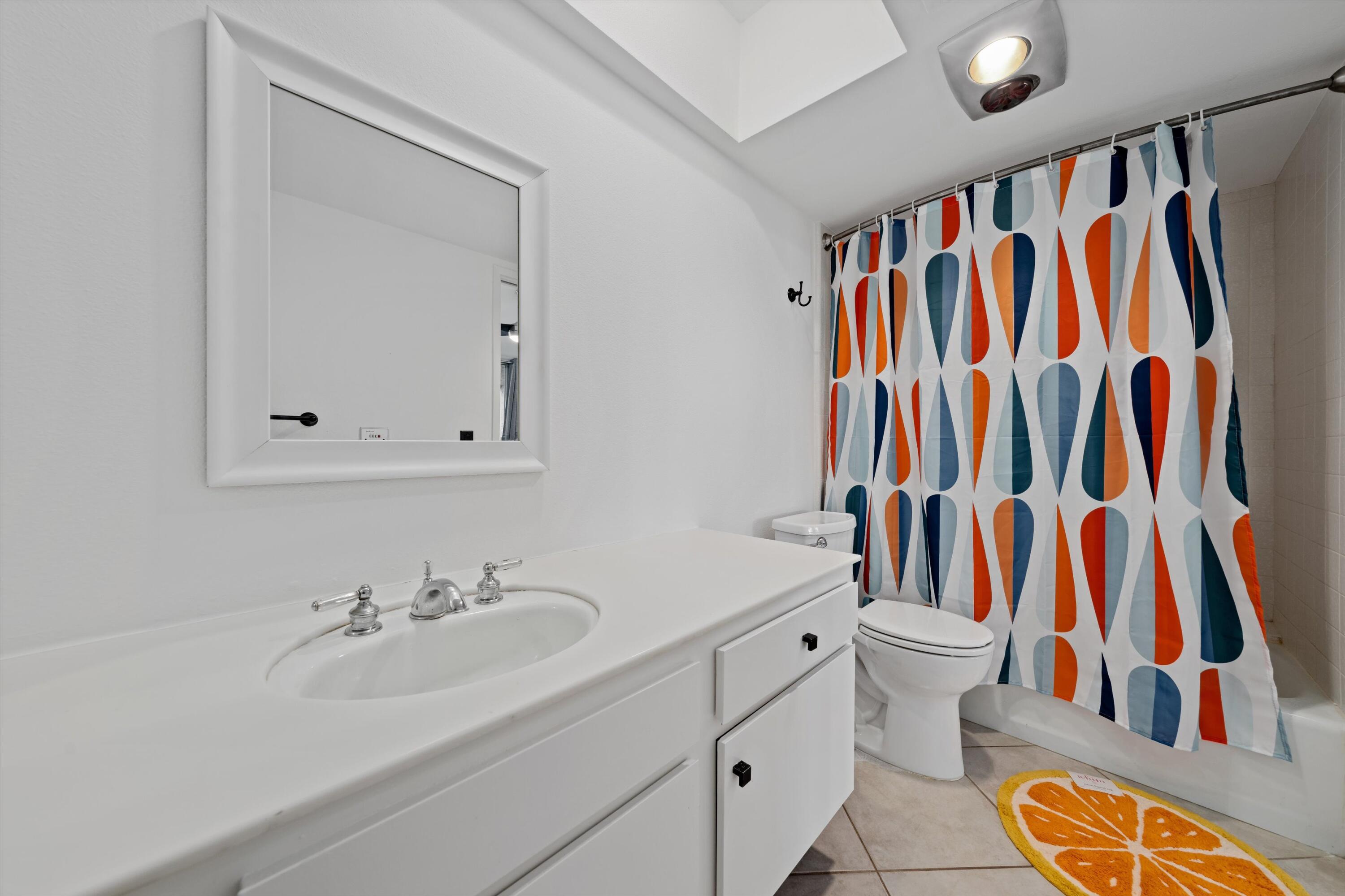 73476 Dalea Lane Palm Desert, CA 92260 - Photo 31 of 37 a bathroom with a sink and a mirror