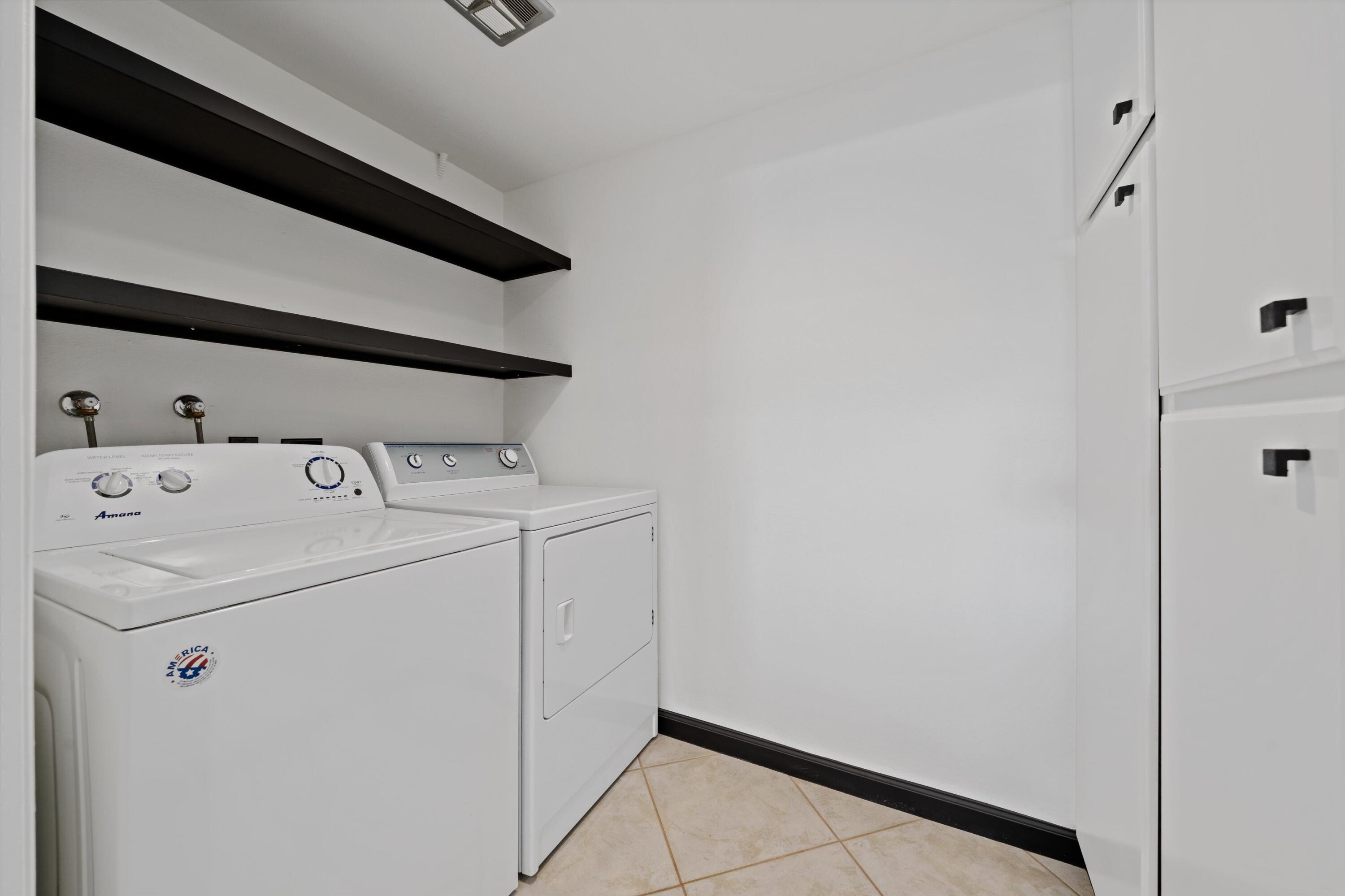73476 Dalea Lane Palm Desert, CA 92260 - Photo 33 of 37 a utility room with dryer and washer