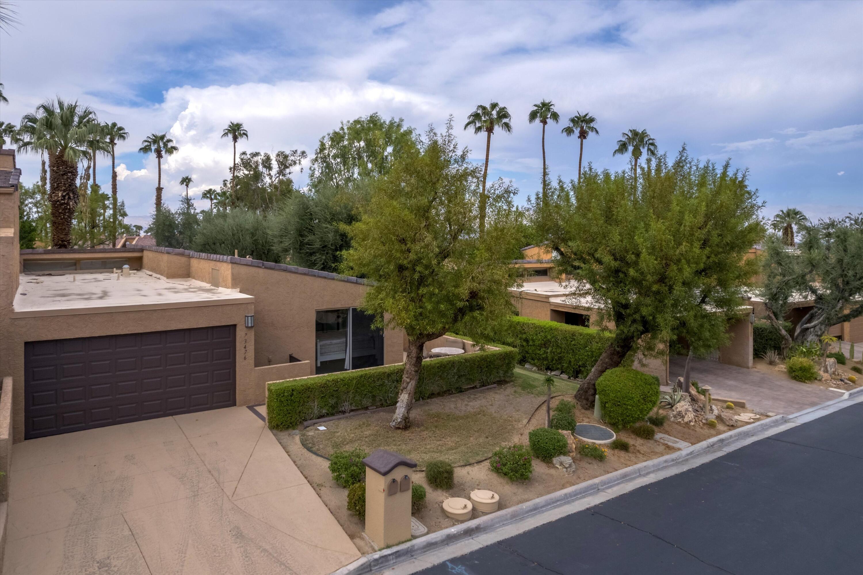 73476 Dalea Lane Palm Desert, CA 92260 - Photo 7 of 37 a view of a house with outdoor space and street view