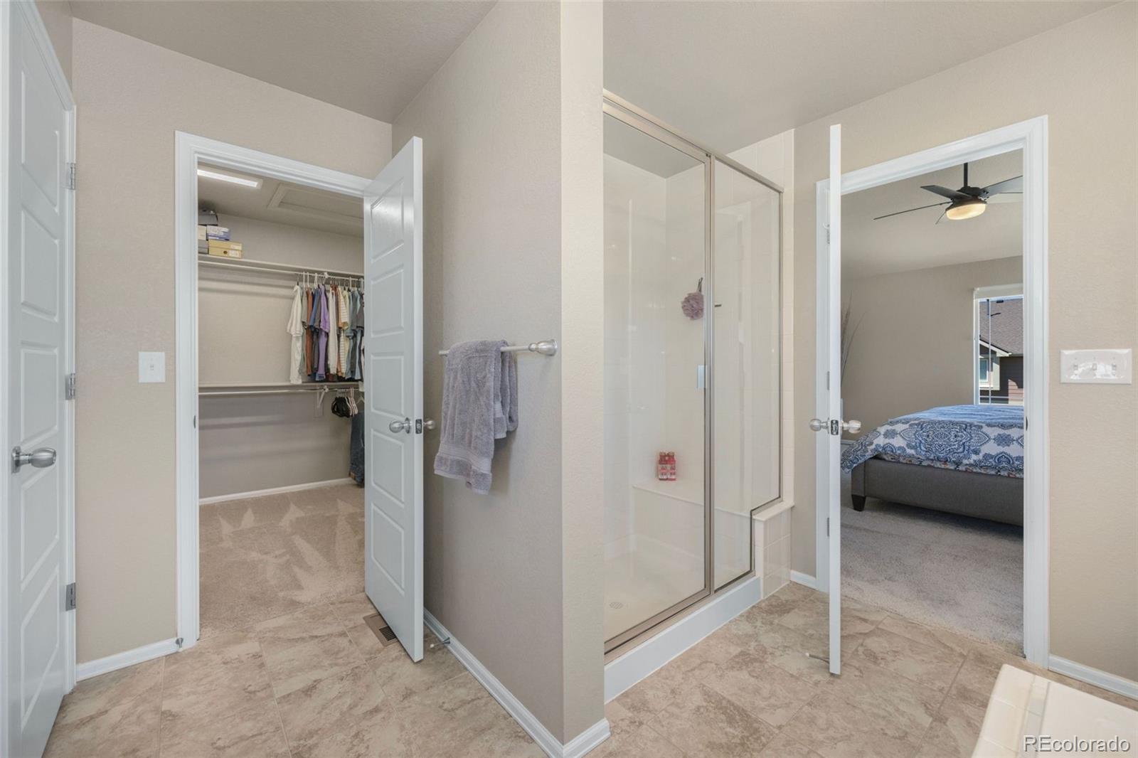 8809 Foxfire Street Firestone, CO 80504 - Photo 21 of 32 a view of a bedroom from a bathroom