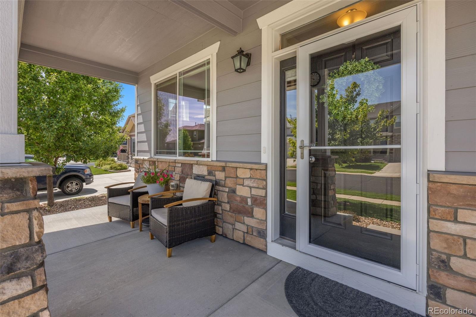 8809 Foxfire Street Firestone, CO 80504 - Photo 3 of 32 a living room with furniture