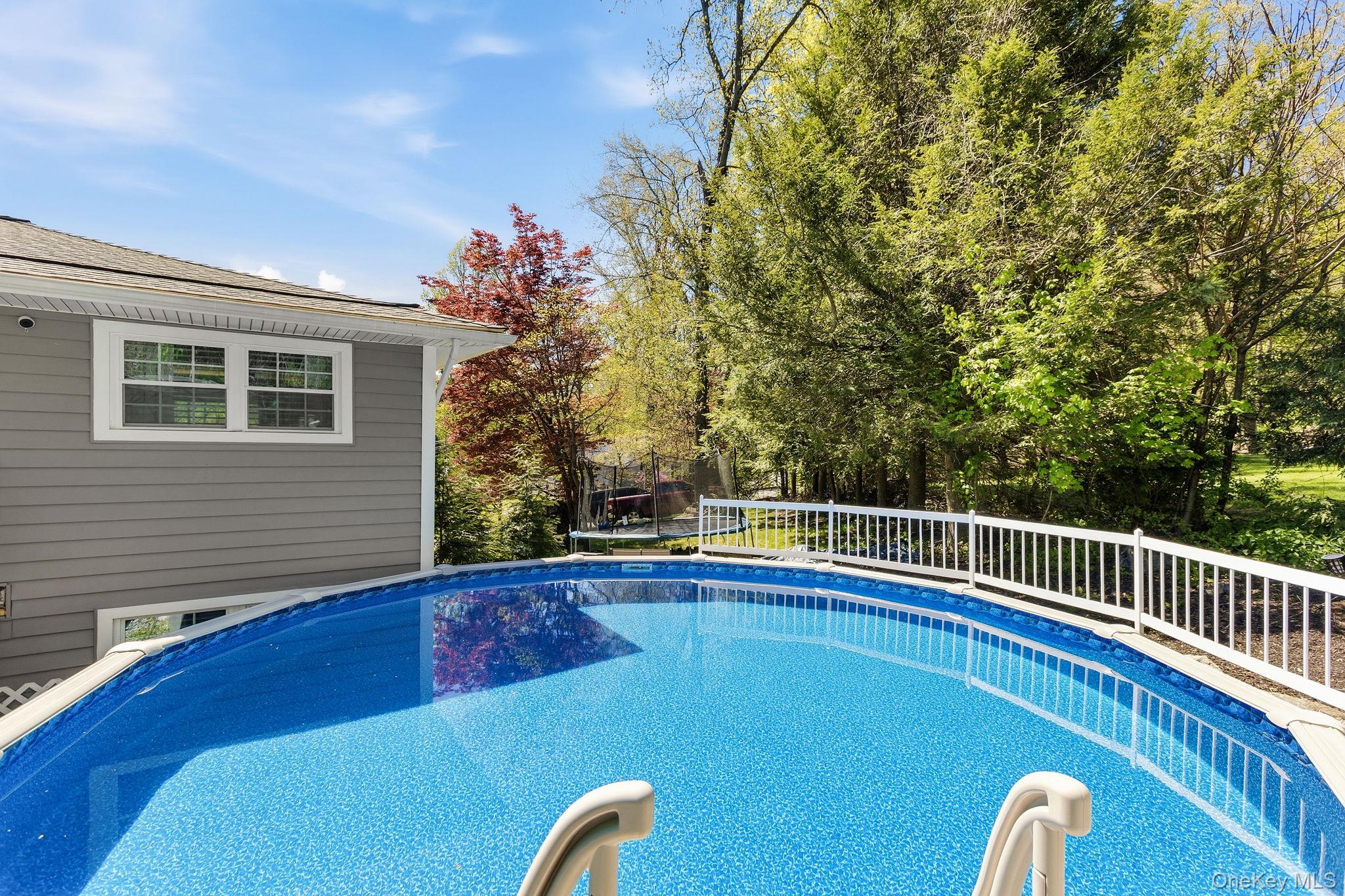 56 Tanager Road Mahopac, NY 10541 - Photo 27 of 30 a view of a swimming pool with a patio