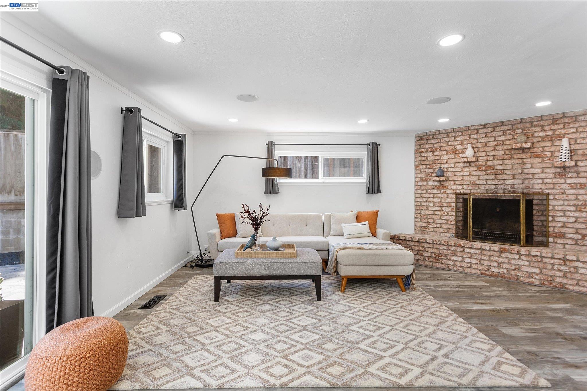16683 Kildare Road Castro Valley, CA 94546 - Photo 29 of 77 a living room with furniture and a fireplace