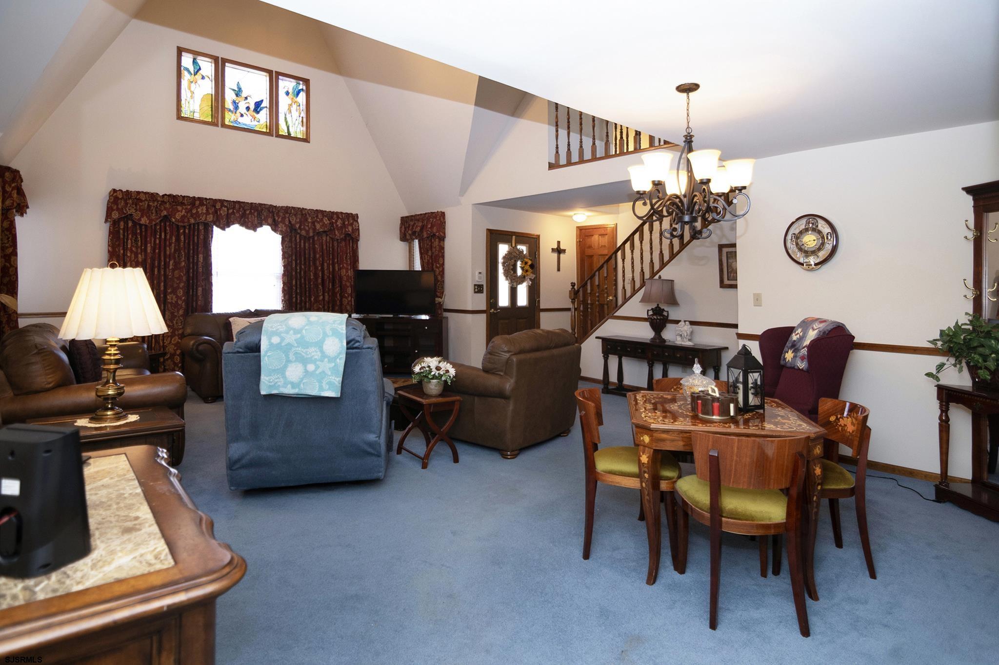 55 Taylor Avenue Milmay, NJ 08340 - Photo 13 of 53 a view of a dining room with furniture and chandelier