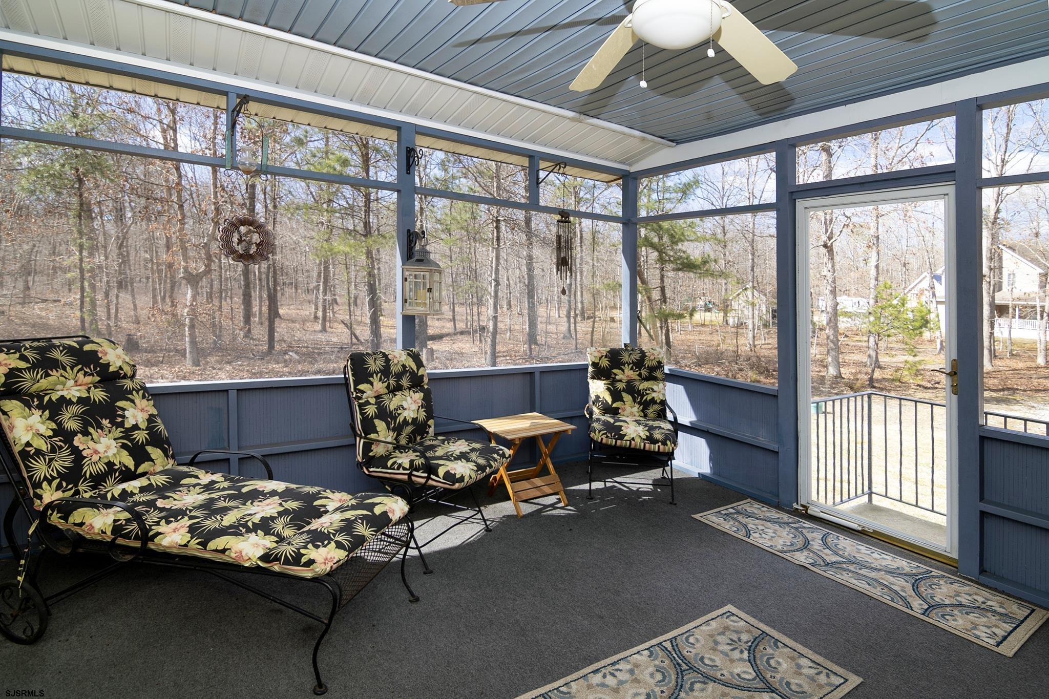 55 Taylor Avenue Milmay, NJ 08340 - Photo 21 of 53 a living room with furniture and floor to ceiling windows