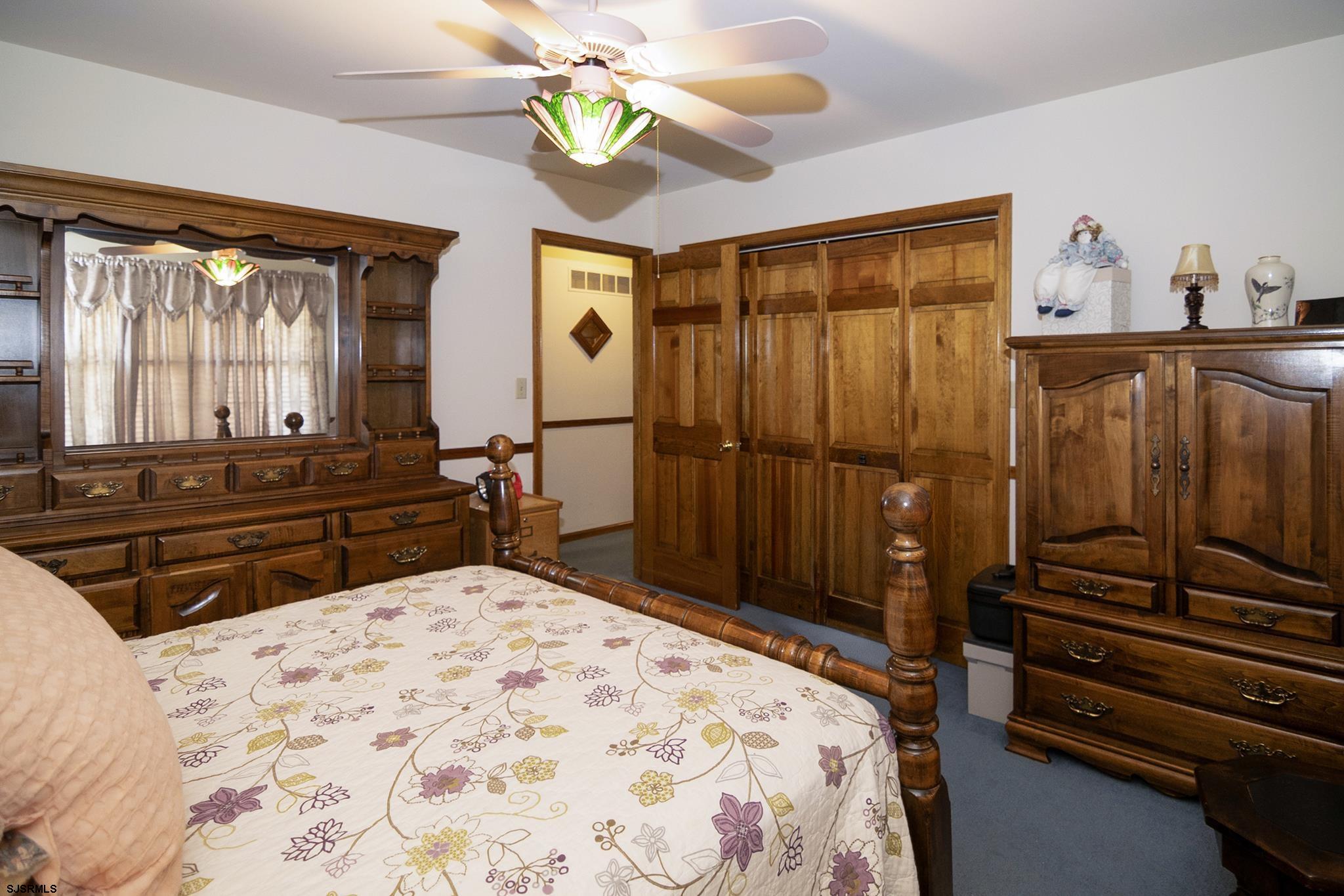55 Taylor Avenue Milmay, NJ 08340 - Photo 23 of 53 a bedroom with a bed and wooden floor