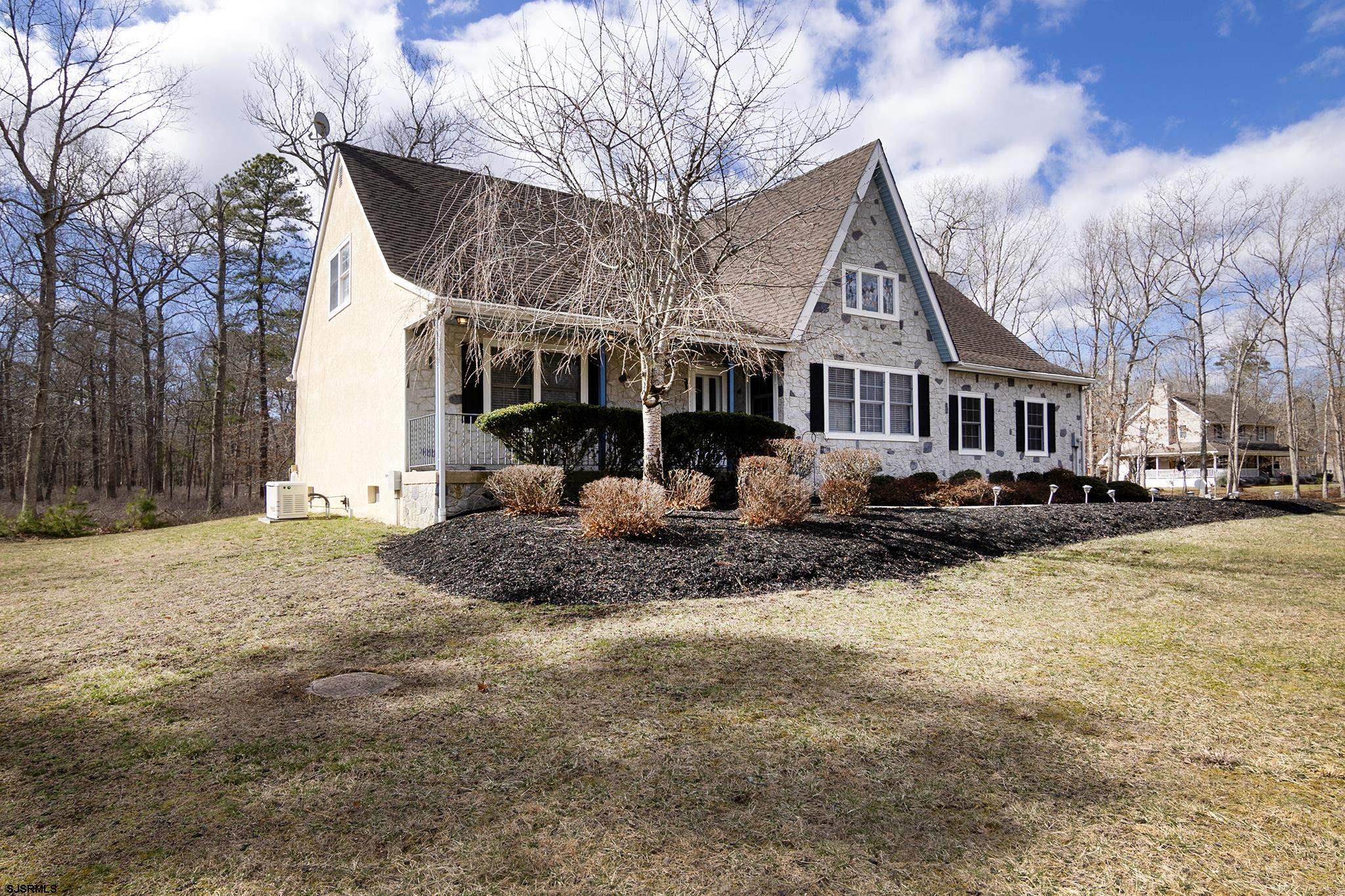 55 Taylor Avenue Milmay, NJ 08340 - Photo 3 of 53 a front view of house with yard covered in snow